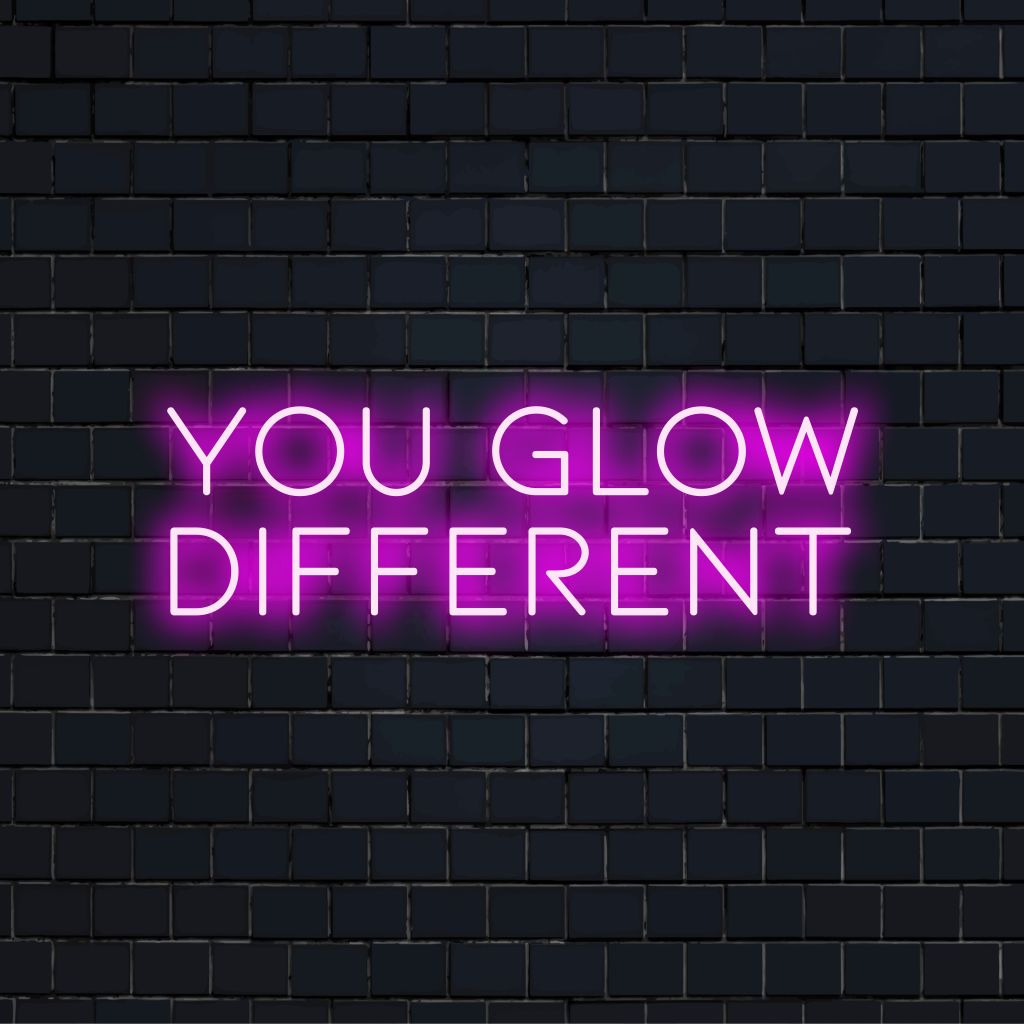 You Glow Different LED Neon Sign, bright LED glow against black brick wall