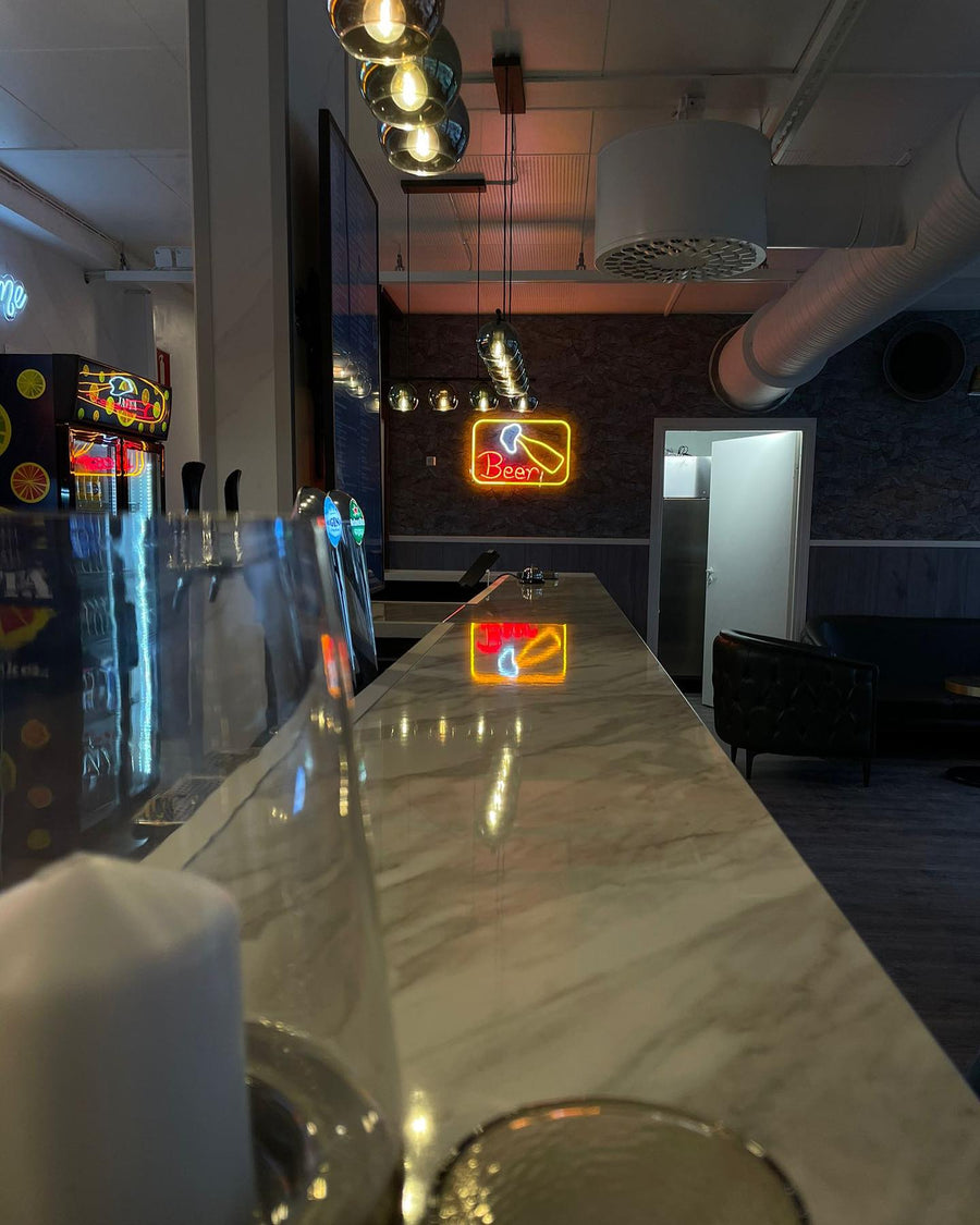 Neon signs inside a gaming and arcade venue
