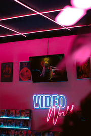 Custom media logo LED neon sign in a studio