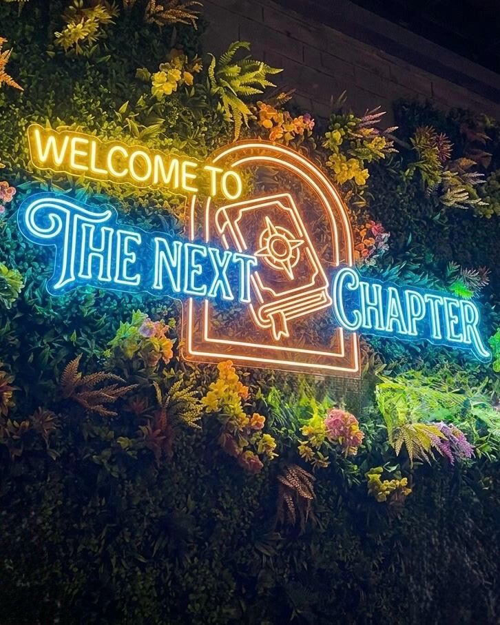 Wedding welcome LED neon sign on a greenery wall