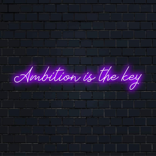 Skräddarsydd LED-neonskylt som visar Ambition Is The Key i livfulla färger, perfekt för personlig inredning.