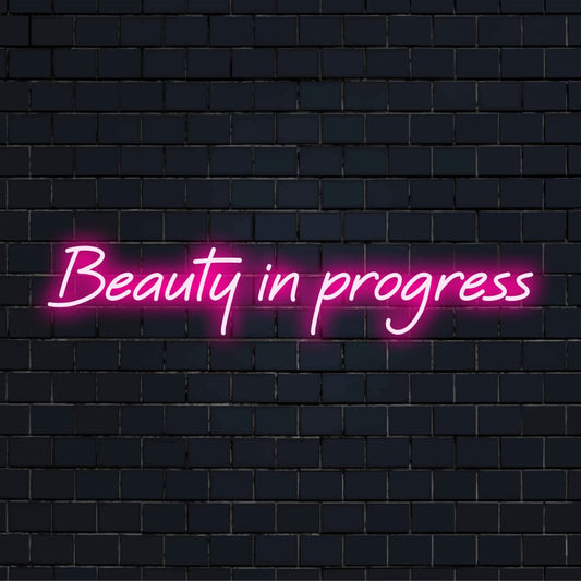 Custom LED neon sign displaying 'Beauty In Progress'; perfect neon decor for adding elegance and charm to any space.