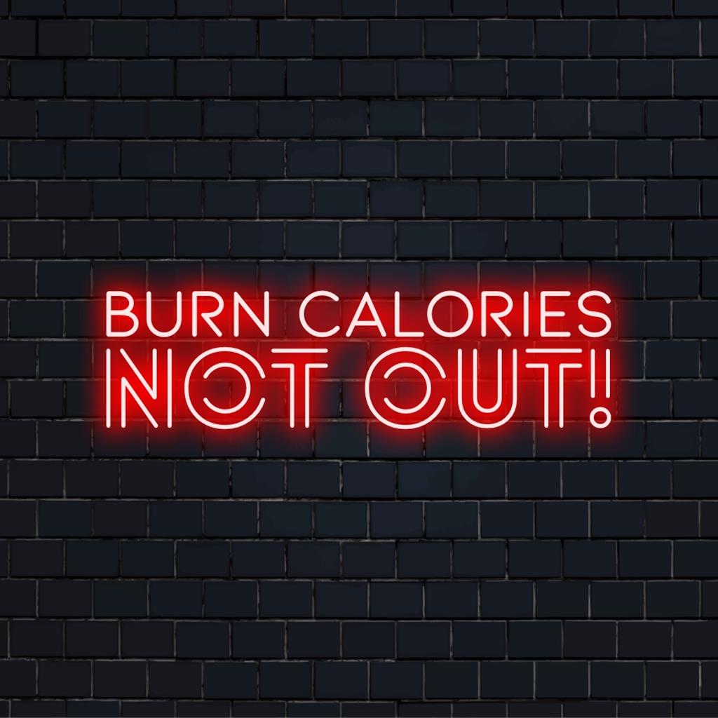 Anpassad LED neonskylt med lekfull Burn Calories Not Out! meddelande; idealisk personlig inredning för pulserande hem eller gym.