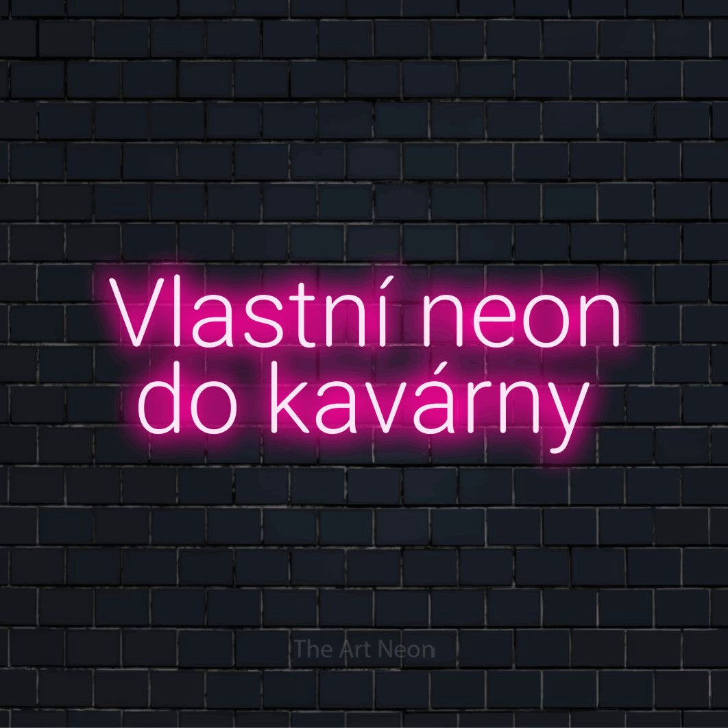 Neonový nápis na míru „Vlastní neon do kavárny“ na černé cihlové zdi