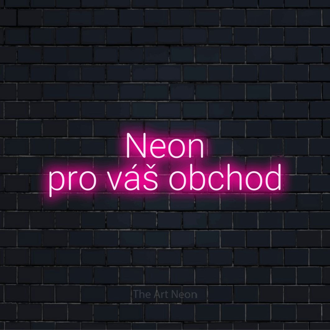 Neonový nápis na míru „Neon pro váš obchod“ na černé cihlové zdi