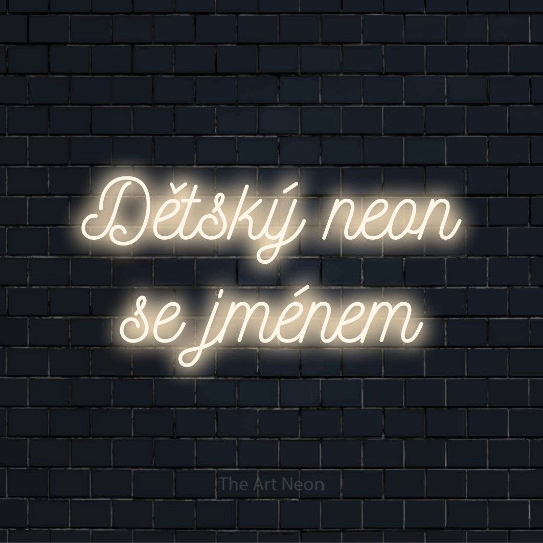 Neonový nápis na míru „Dětský neon se jménem“ na černé cihlové zdi
