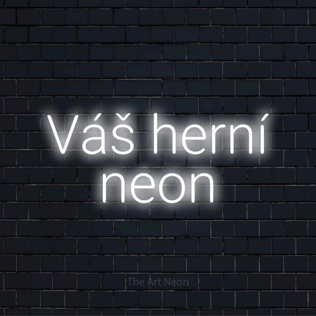 Neonový nápis na míru „Váš herní neon“ na černé cihlové zdi