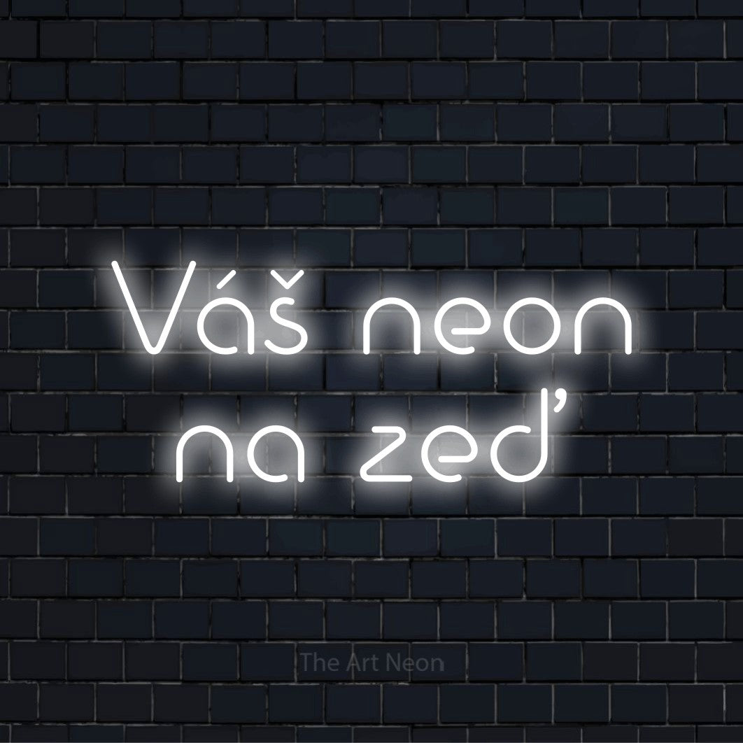 Neonový nápis na míru „Váš neon na zeď“ na černé cihlové zdi