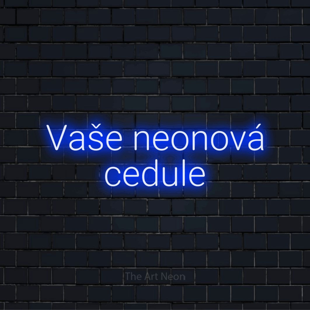 Neonový nápis na míru „Vaše neonová cedule“ na černé cihlové zdi