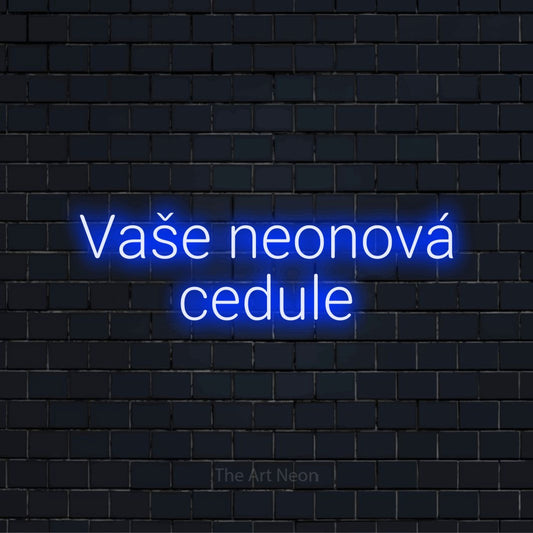 Neonový nápis na míru „Vaše neonová cedule“ na černé cihlové zdi
