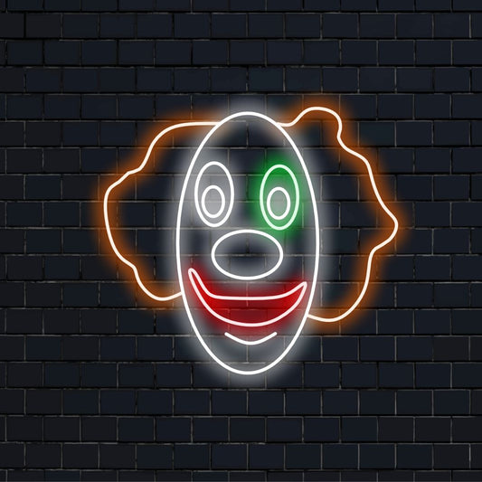 "Clown Face Neon Sign" ��� Ett lekfullt och levande neonljus som visar upp den nyckfulla designen av ett clownansikte, som ger ditt utrymme gladlynthet och en touch av kul.