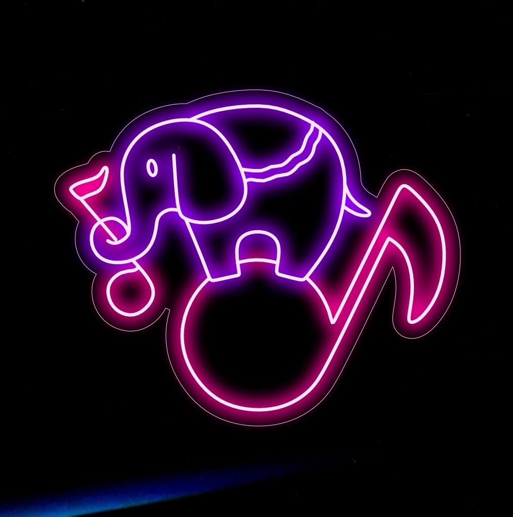 "Elephant Silhouette with Music Notes Neon Sign" lyser harmoniskt upp och smälter samman majestätisk närvaro med rytmiska toner, perfekt för musikstudior och kulturella utrymmen.