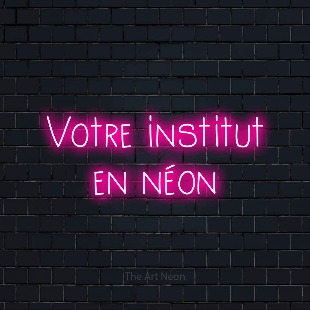 Enseigne néon personnalisée « Votre institut en néon » sur un mur en briques noires