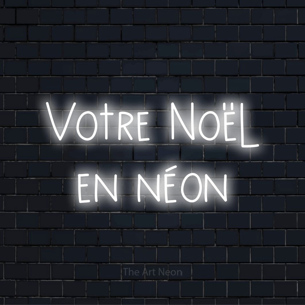 Enseigne néon personnalisée « Votre Noël en néon » sur un mur en briques noires