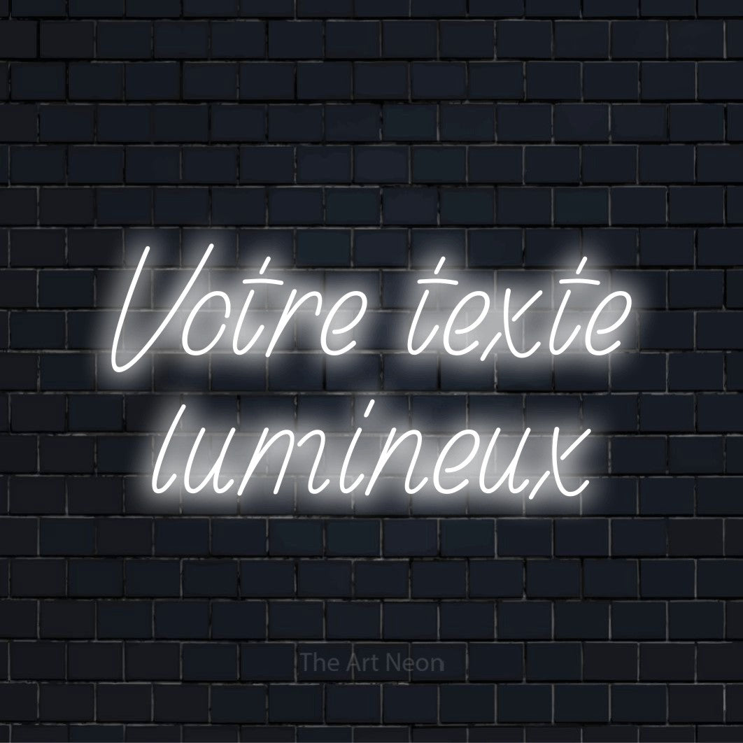 Enseigne néon personnalisée « Votre texte lumineux » sur un mur en briques noires