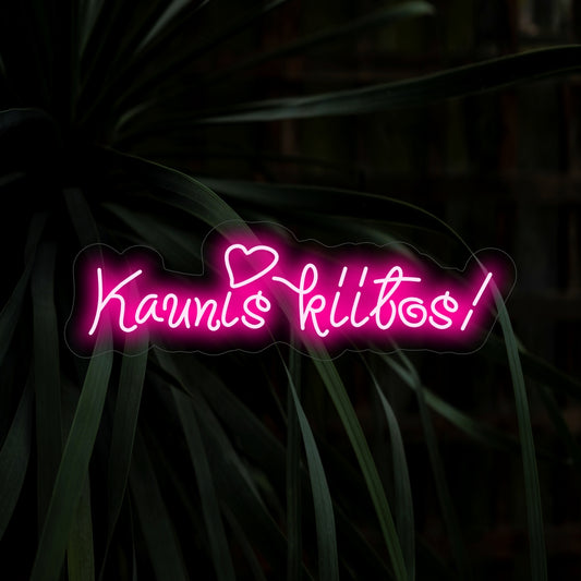 "Kaunis Kiitos! Neonskylt" - Lys upp din tacksamhet med denna vackra neonskylt. Dess varma glöd ger en touch av elegans till utrymmen där uppskattning omhuldas.