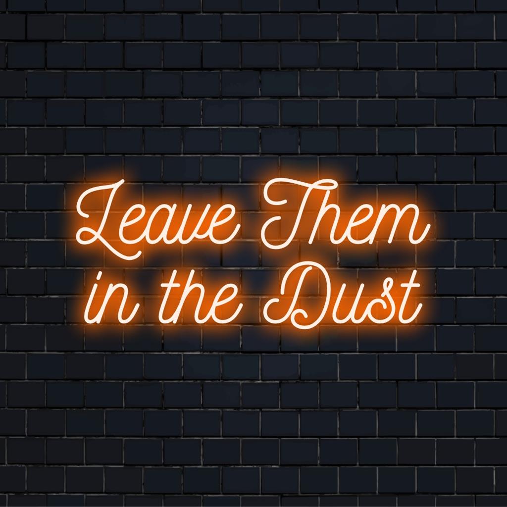 Anpassad LED-neonskylt med ett djärvt Leave Them In The Dust-meddelande, perfekt för inspirerande inredning.