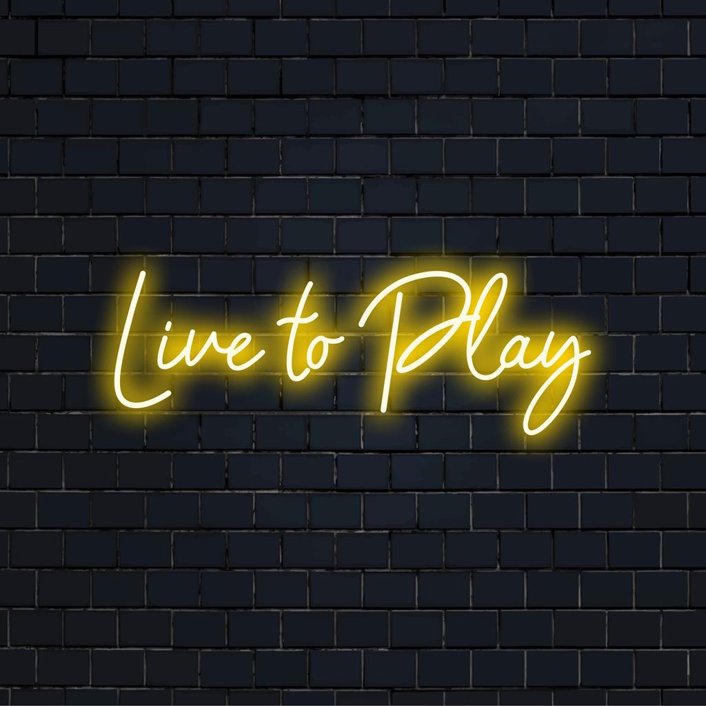 LED-neonskylt med frasen Live To Play, glödande livfullt. Idealisk för uttrycksfulla neonkonst entusiaster.