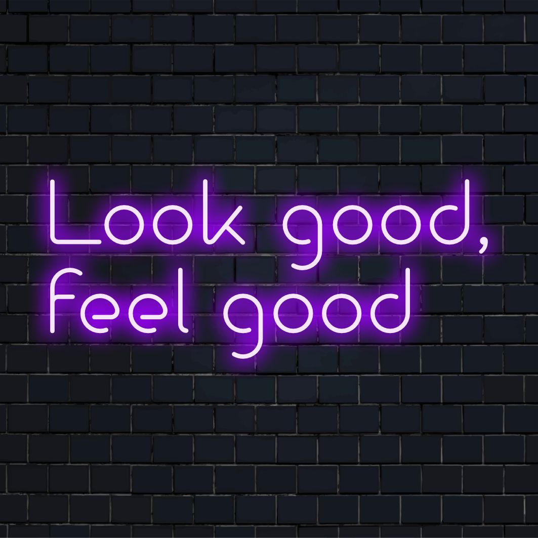 En levande neonskylt med frasen Look Good, Feel Good, perfekt som iögonfallande dekor för alla utrymmen.