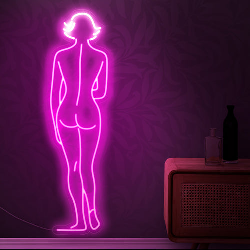 "Naked Woman Walking Neon Sign" är ett konstnärligt och smakfullt tillägg, perfekt för utrymmen som uppskattar skönheten i figurativ konst. Lys upp med estetisk elegans!