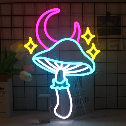 The image features a vibrant LED neon sign depicting a whimsical design of a star, moon, and mushroom.