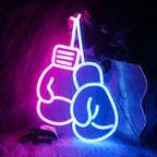 Bilden har en levande, handgjord LED-neonskylt i form av boxningshandskar.