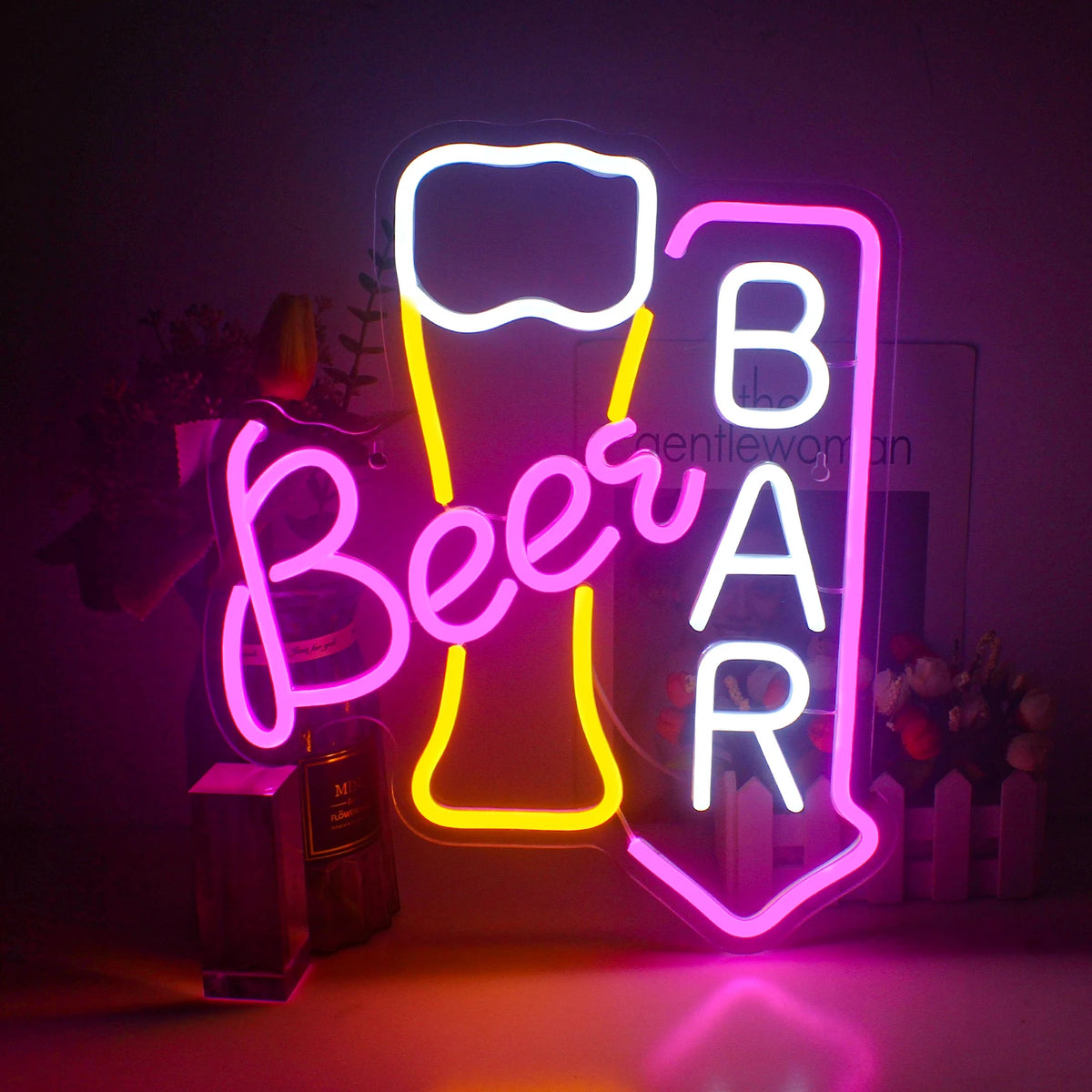 En livlig LED-neonskylt som visar ordet "Beer Bar" i fetstil, versaler.