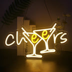 "En livlig LED-neonskylt som visar ordet "Cheers" i ett lekfullt kursivt teckensnitt.