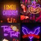 Bilden visar en levande LED-neonskylt som läser "Trick or Treat" med lekfulla, stiliserade bokstäver.