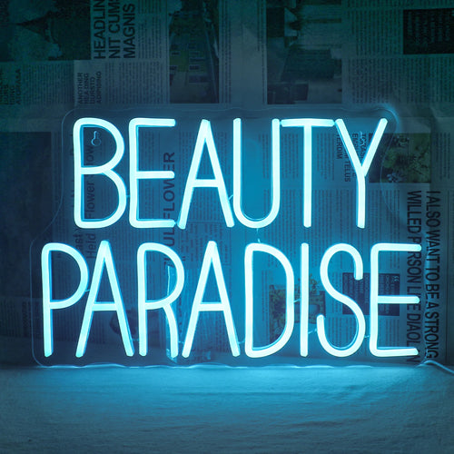 Bilden visar en levande handgjord LED-neonskylt där det står "Beauty Paradise" med eleganta kursiva bokstäver.