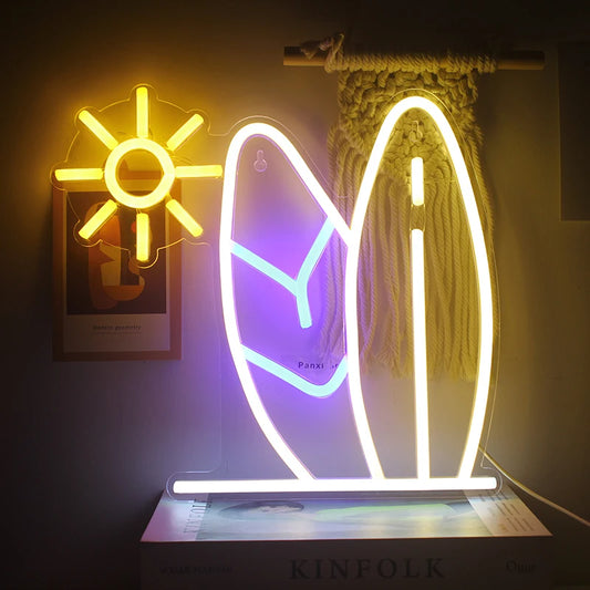 The image showcases a vibrant LED neon sign in the shape of a surfboard.