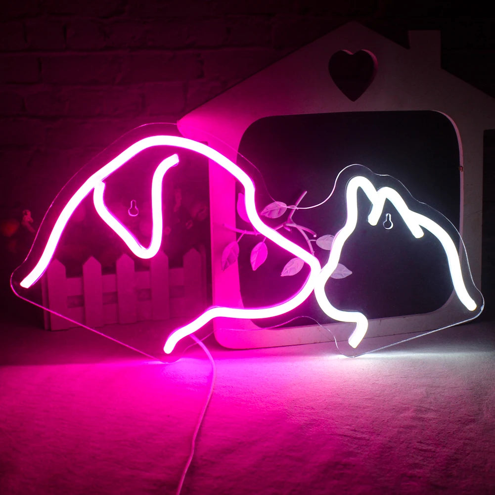 Bilden visar en livfull, budgetvänlig LED-neonskylt som visar konturerna av en hund och en katt som sitter sida vid sida.