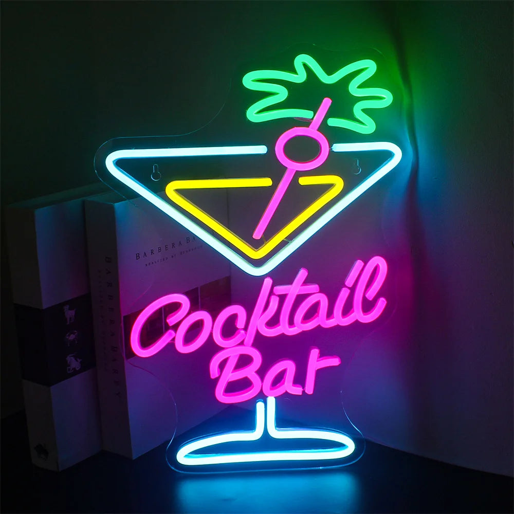 Bilden visar en levande LED-neonskylt designad för en cocktailbar.