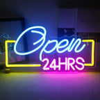 Bilden visar en levande LED-neonskylt formad med orden "24HRS Open.