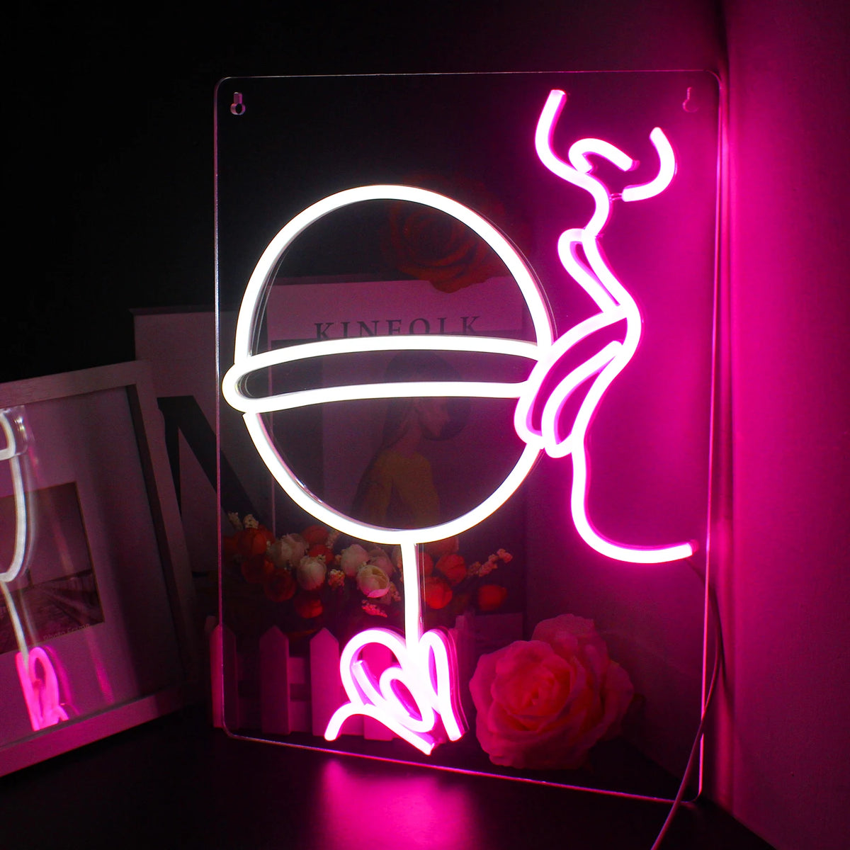 A vibrant, handmade LED neon sign spelling out the word "Party" in cursive letters.