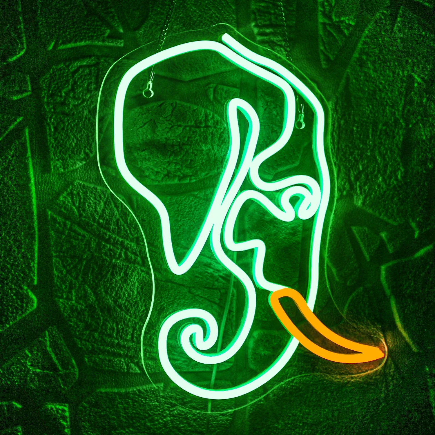 A vibrant LED neon sign shaped like an elephant, featuring a gentle glow in shades of soft white and pastel pink.