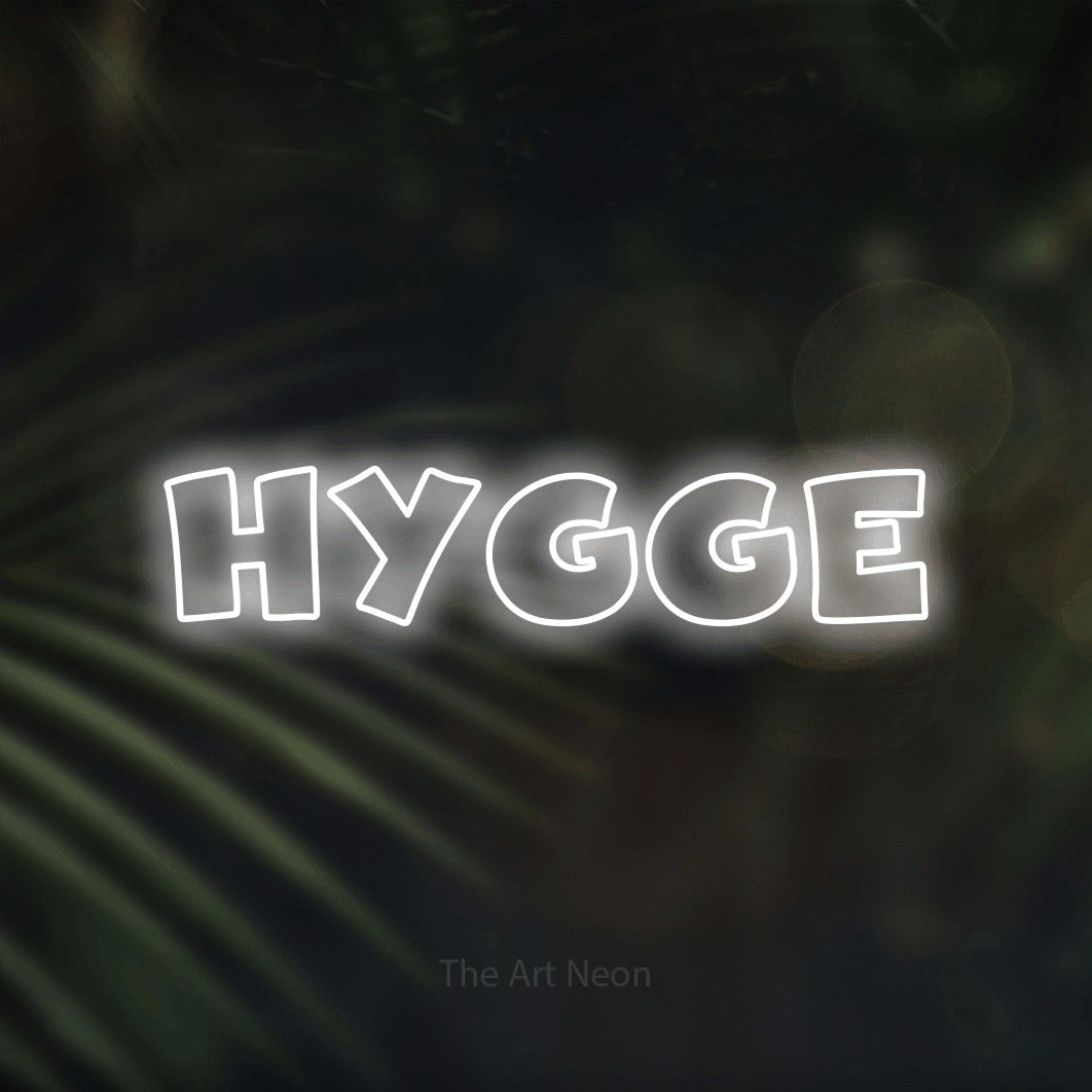 LED neon sign reading “hygge”, arranged in a single line.
