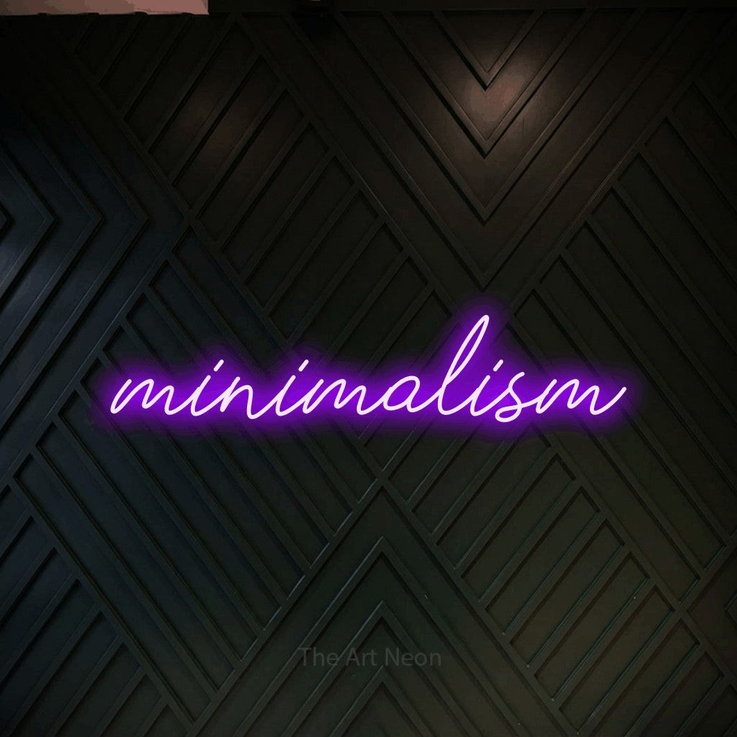 LED neon sign reading “minimalism”, arranged in a single line.