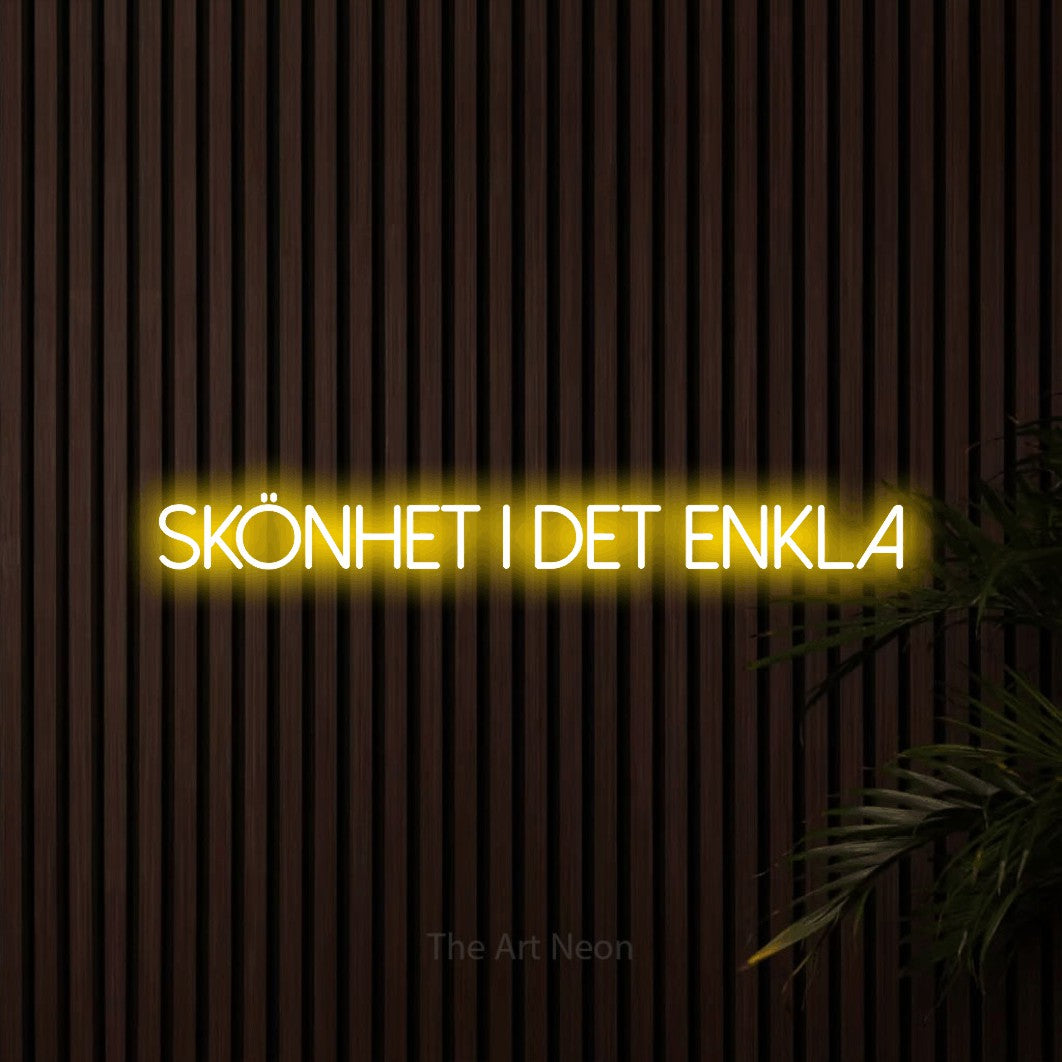 LED neon sign reading “Skönhet I Det Enkla”, arranged in a single line.