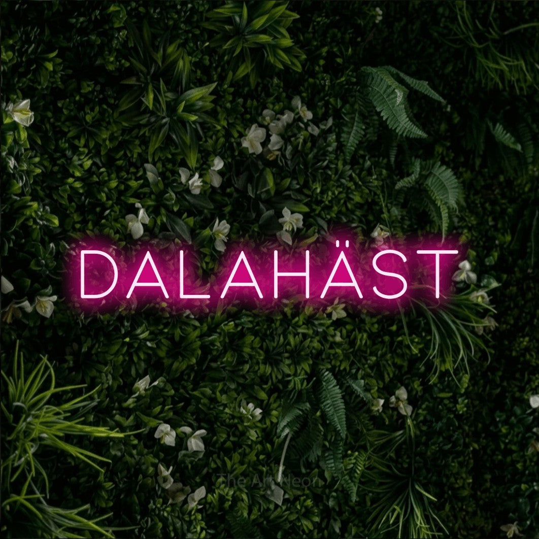 LED neon sign reading “Dalahäst”, arranged in a single line.