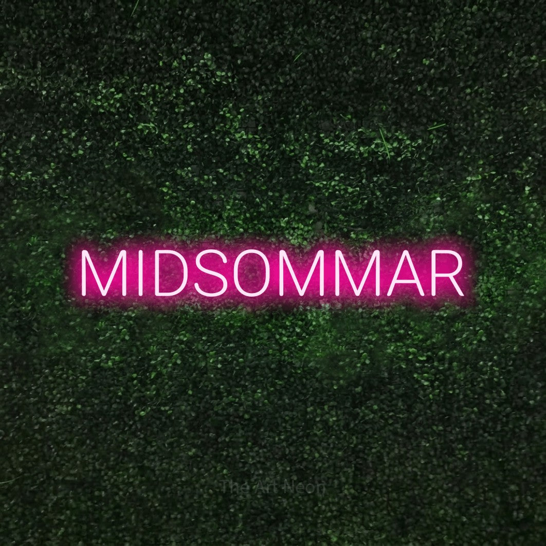 LED neon sign reading “MIDSOMMAR”, arranged in a single line.