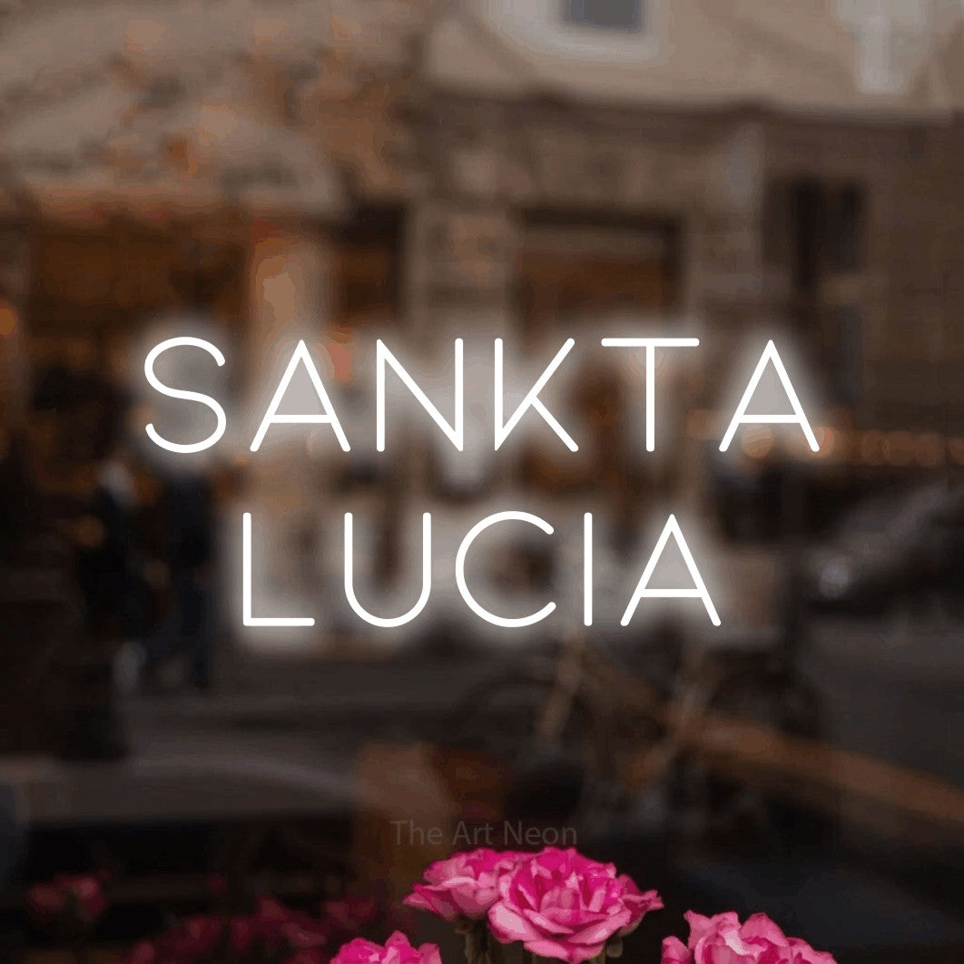 LED neon sign reading “SANKTA LUCIA”, arranged in 2 lines.