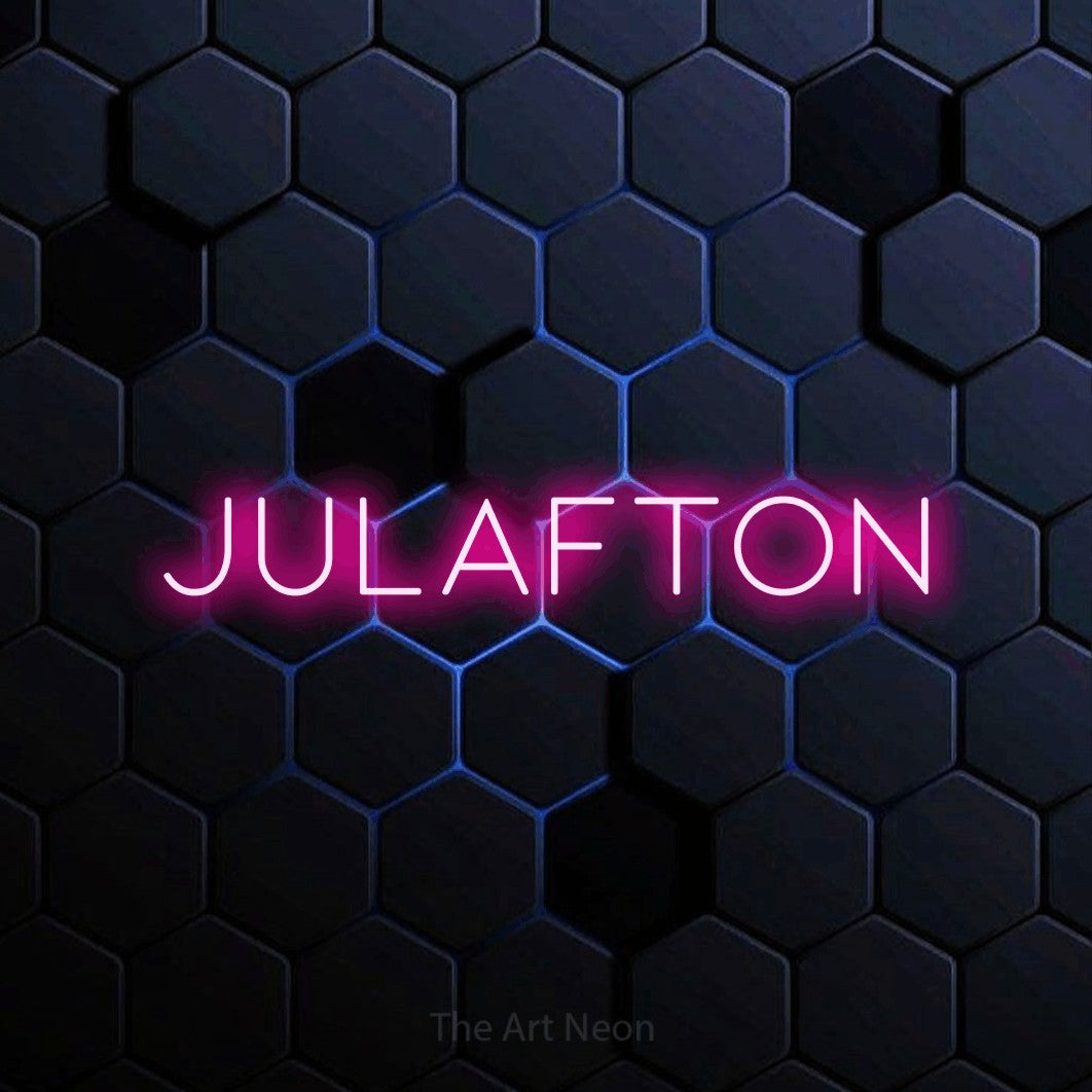LED neon sign reading “JULAFTON”, arranged in a single line.