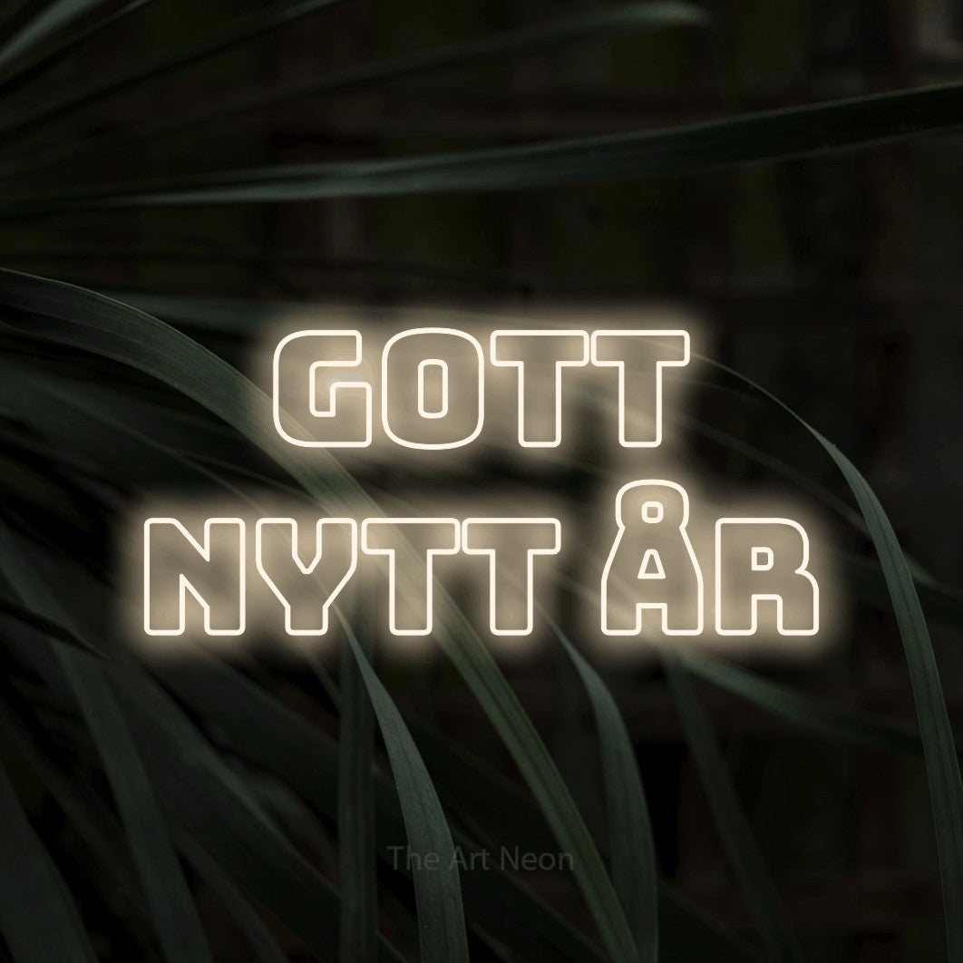 LED neon sign reading “GOTT nytt år”, arranged in 2 lines.