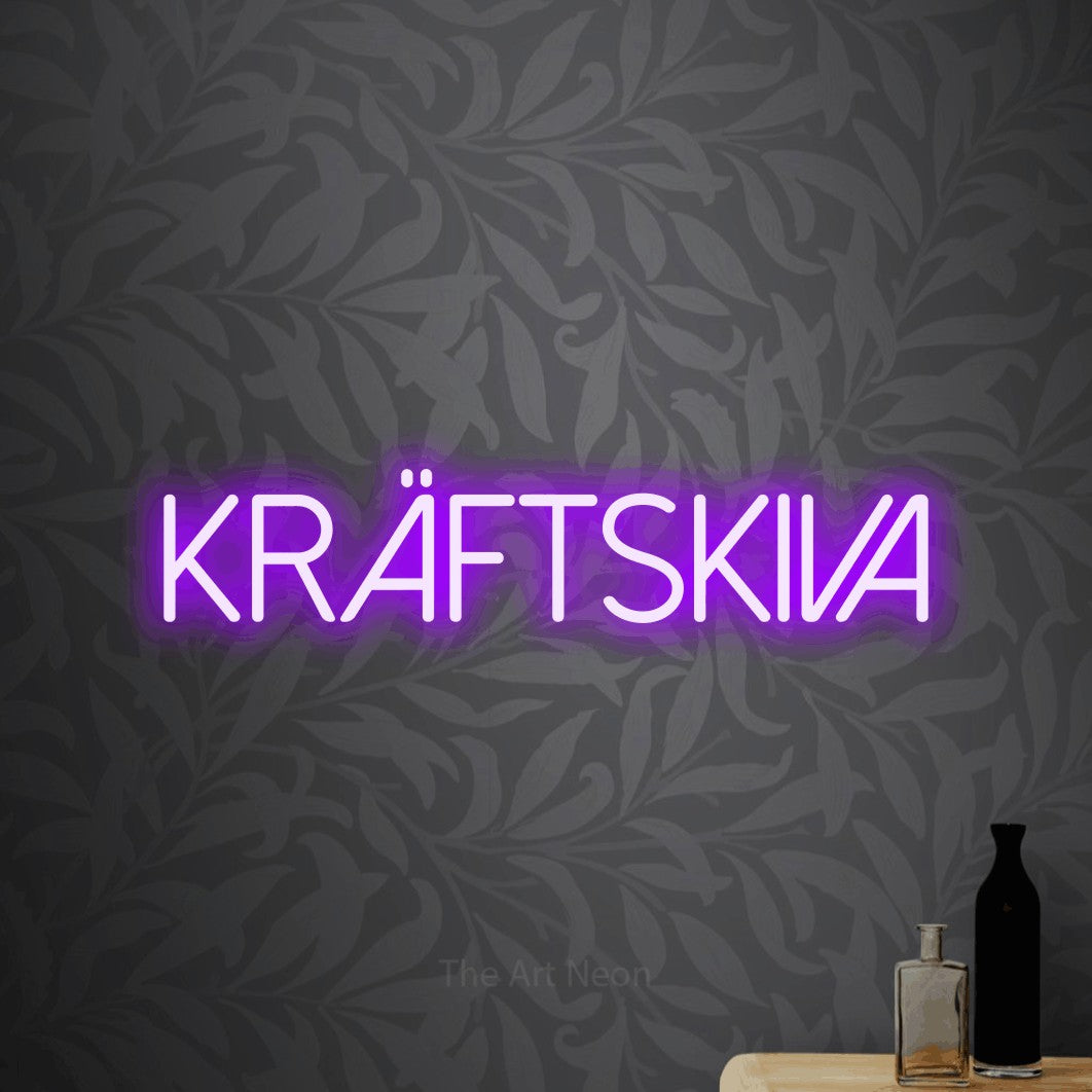 LED neon sign reading “KRÄFTSKIVA”, arranged in a single line.
