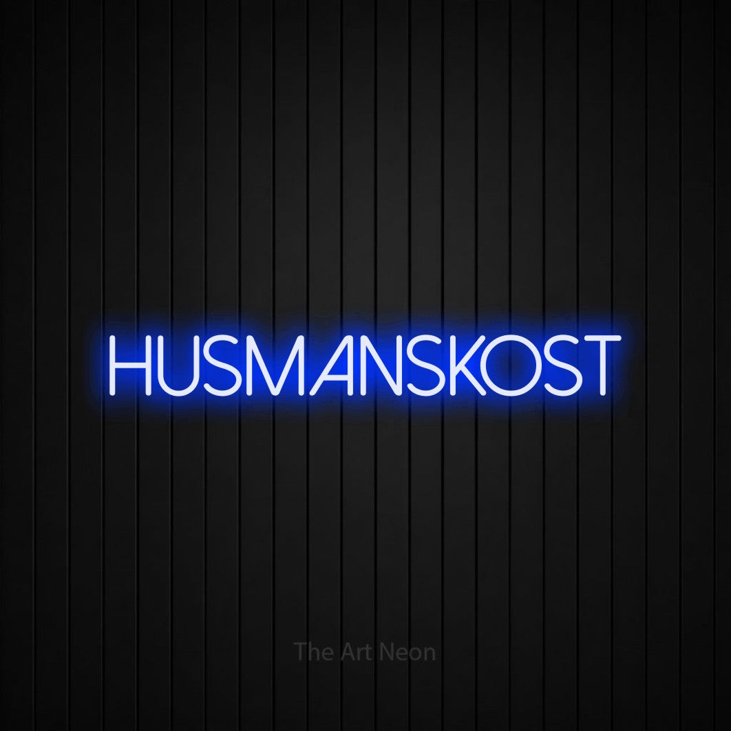 LED neon sign reading “HUSMANSKOST”, arranged in a single line.