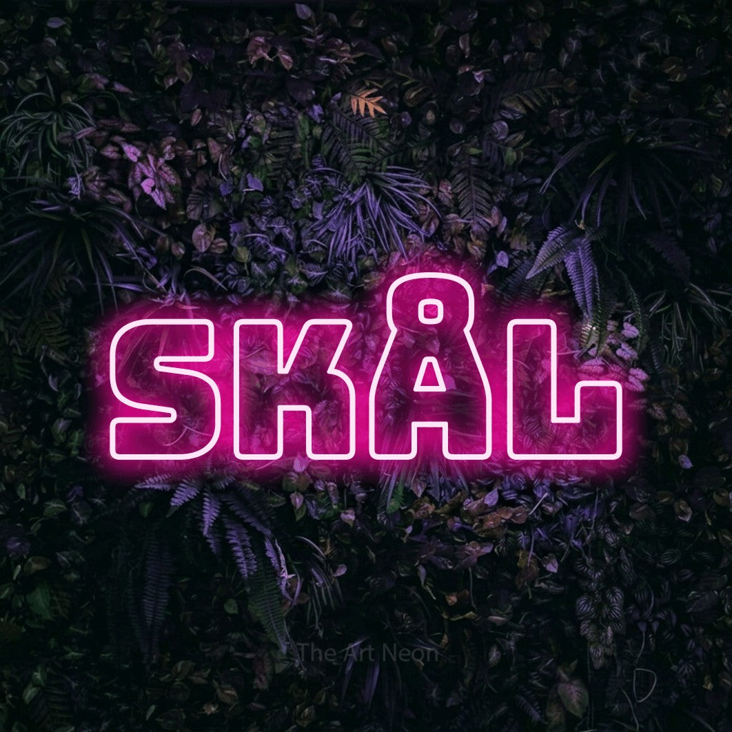 LED neon sign reading “skål”, arranged in a single line.