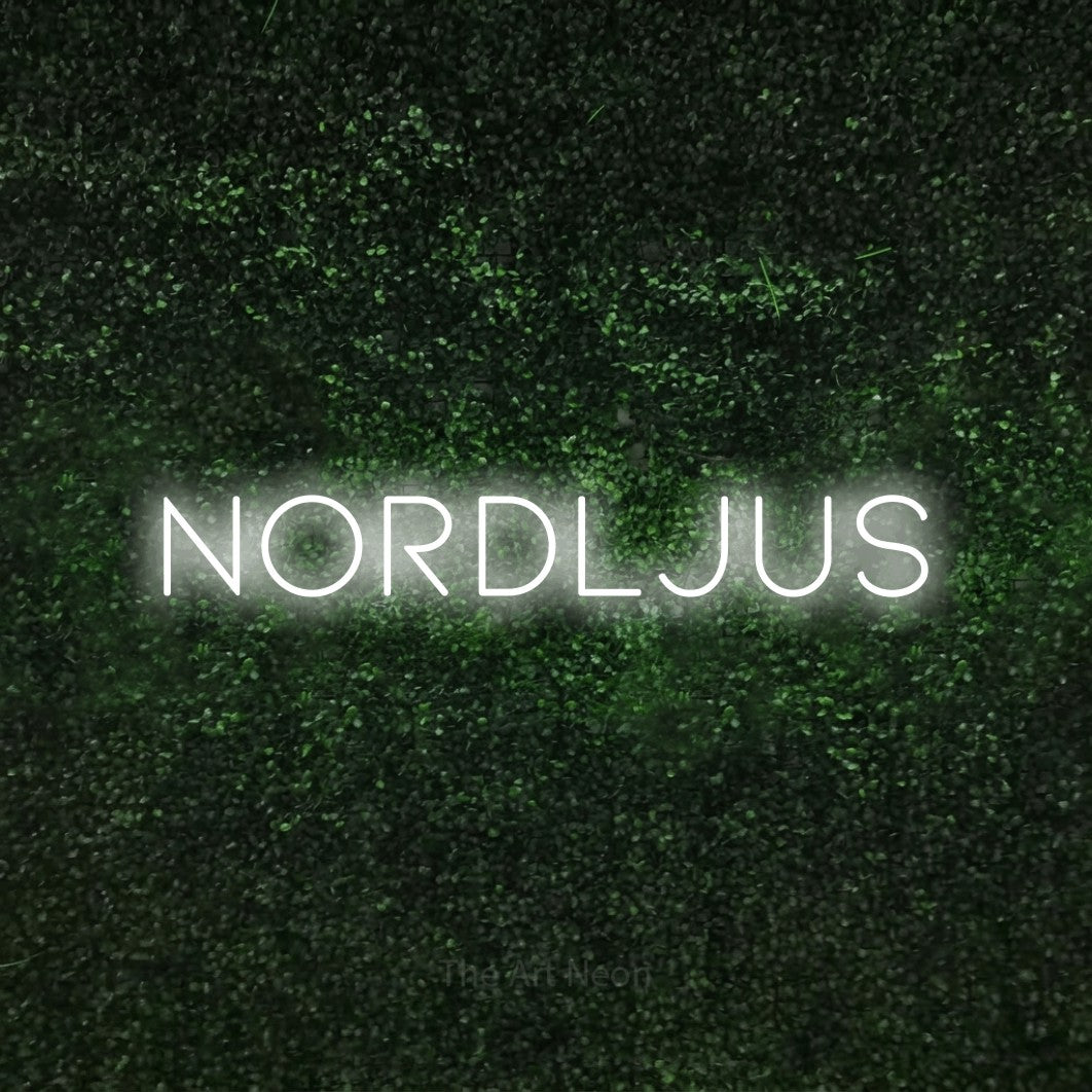 LED neon sign reading “nordljus”, arranged in a single line.