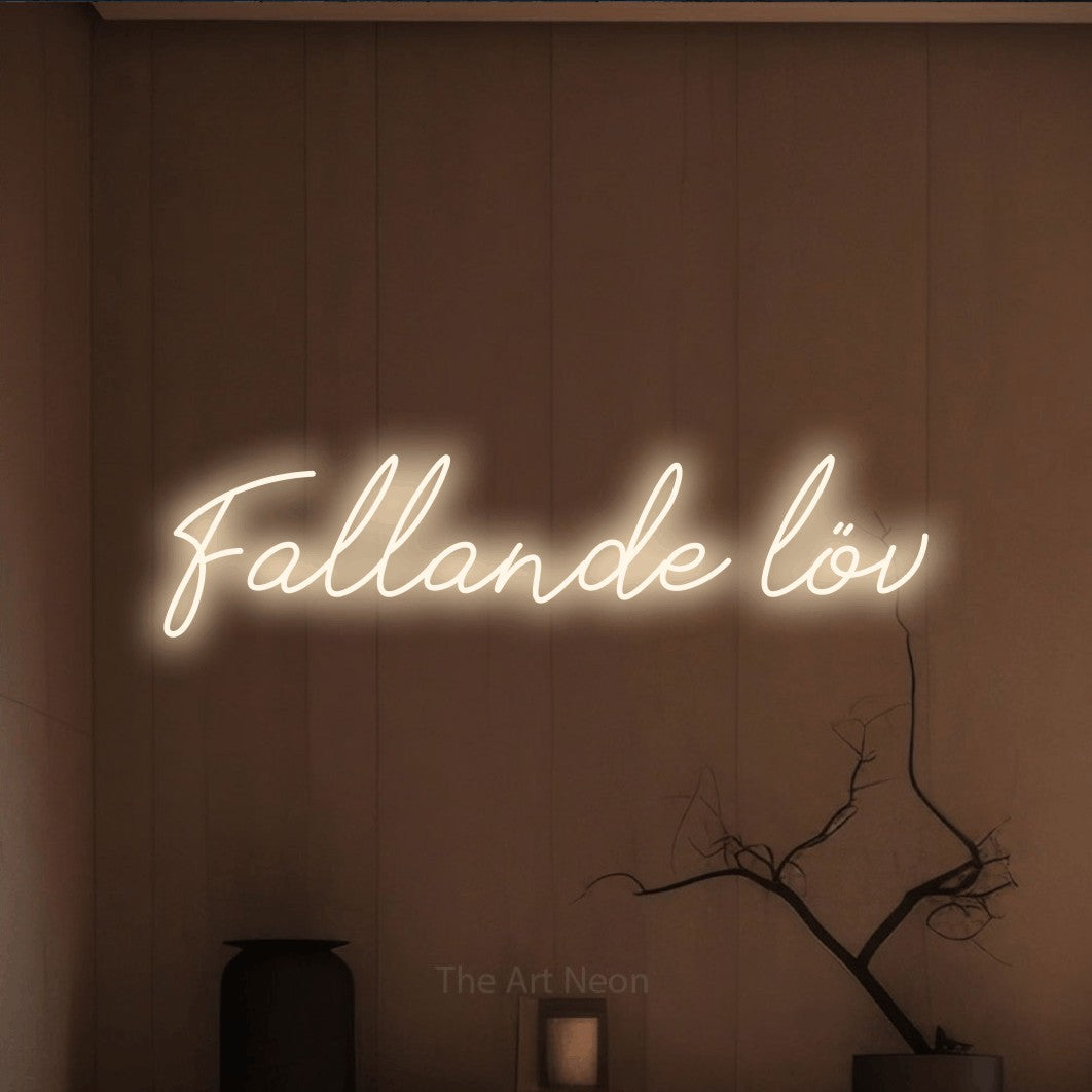 LED neon sign reading “Fallande löv”, arranged in a single line.