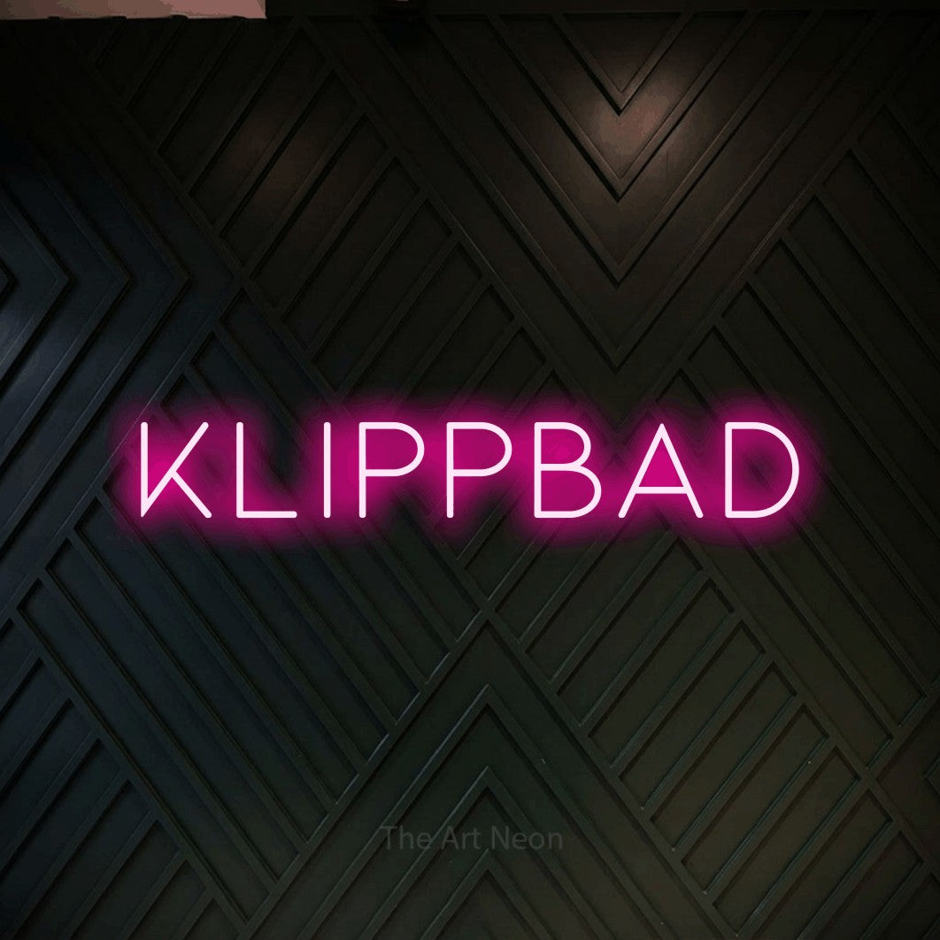 LED neon sign reading “Klippbad”, arranged in a single line.